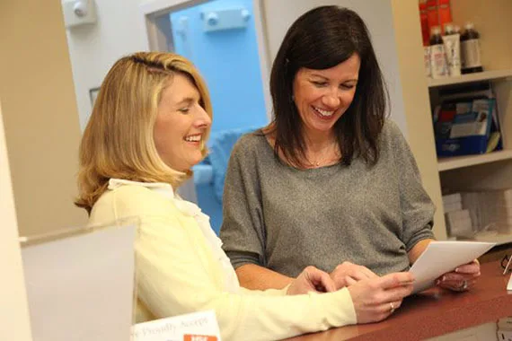 Team members at the front desk